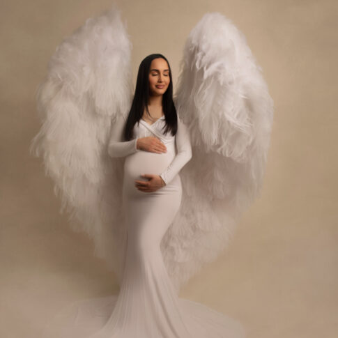 Maternity photo in white angel dress