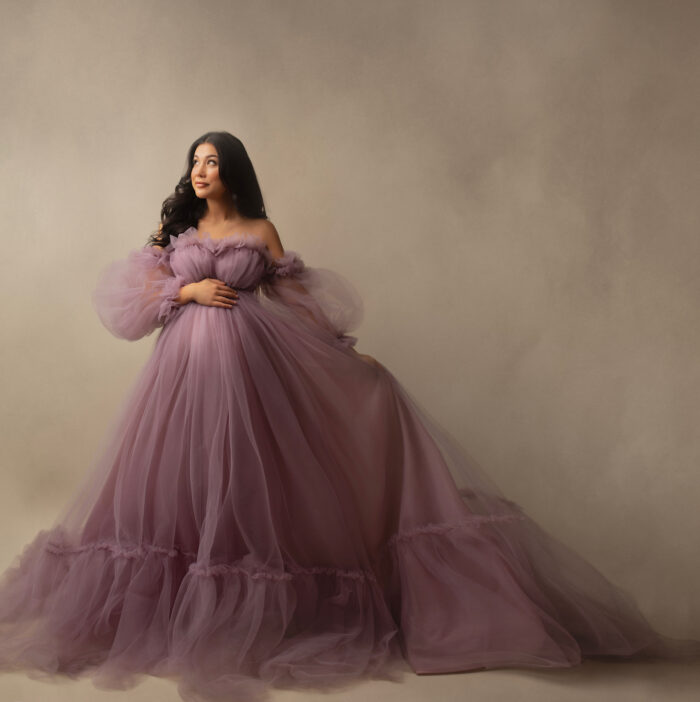 Best Maternity photo in purple dress