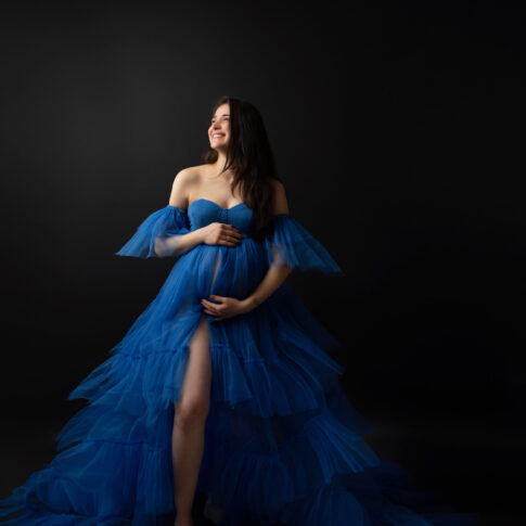 Maternity photo with blue maternity dress